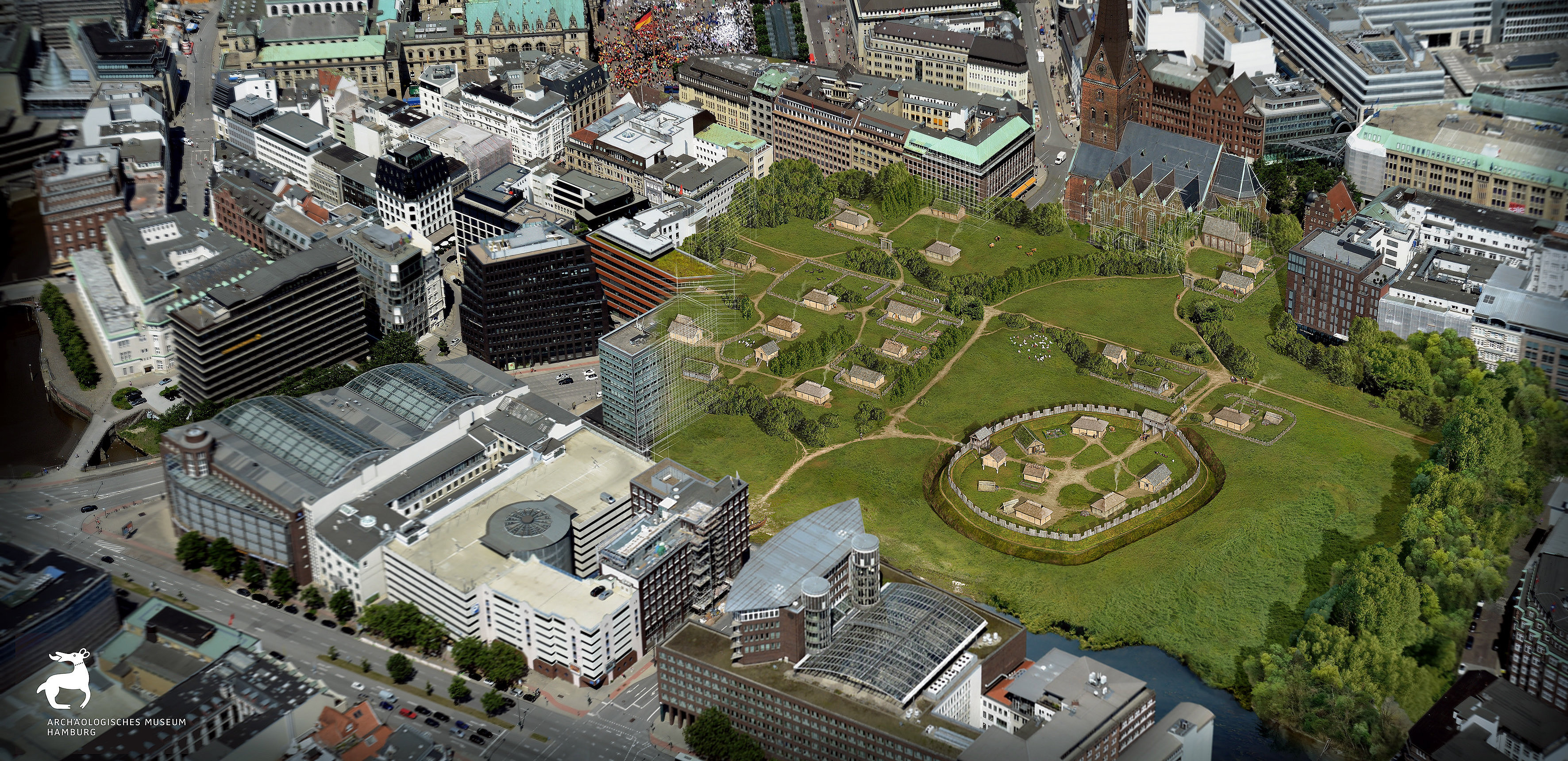 Auf ein Luftbild der Innenstadt von Hamburg wird durch eine virtuelle Rekonstruktion der Hammaburg überlagert.